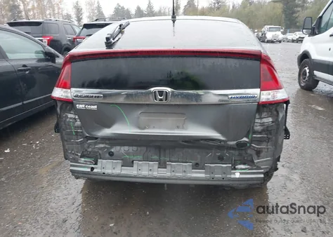 2013 Honda Insight z USA, uszkodzony, nr VIN JHMZE2H38DS005460